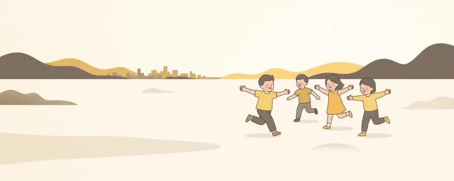 Four children running with their arms outstretched across a wide open landscape, with distant hills and a far-off skyline behind them.