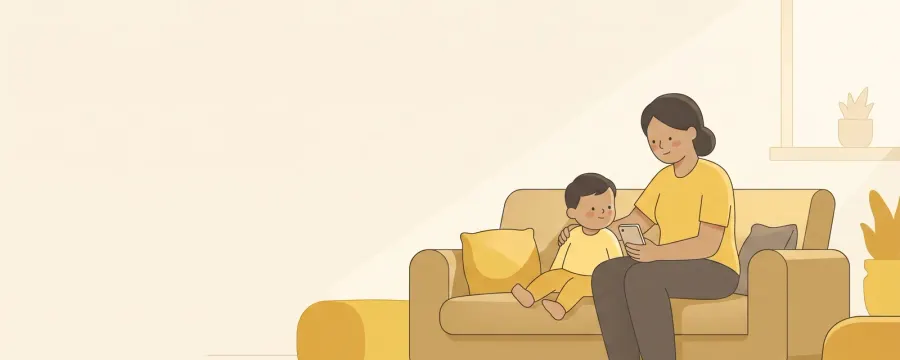 A parent and a young child sitting together on a sofa, sharing a phone held at a comfortable arm's length, with daylight coming through the window behind them.